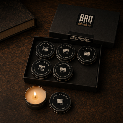 The Bro Candle Discovery Set open on a desk, six mini tins and one lit