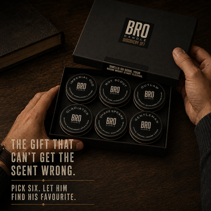 Hands holding the open Bro Candle Discovery Set gift box